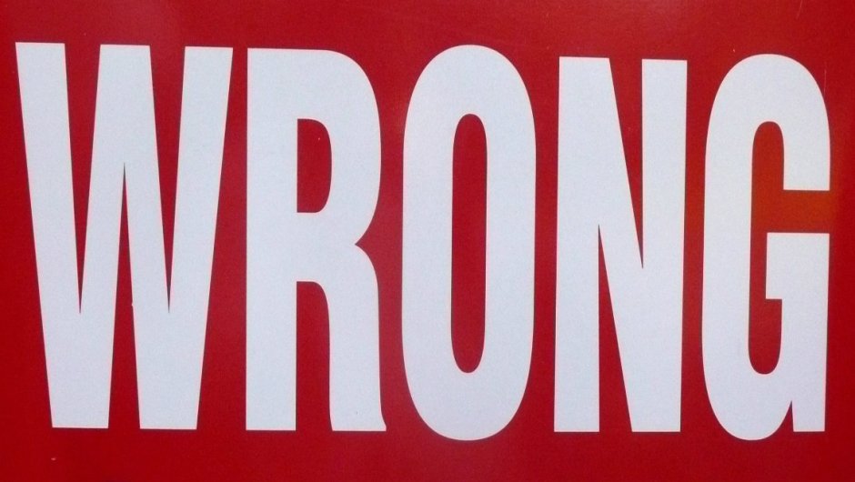 A red and white "wrong" sign